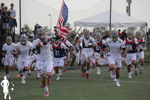 Team USA storming the field in 2014