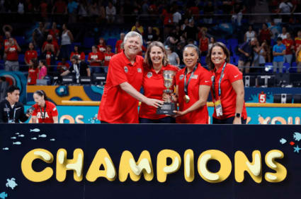 George Washington head coach Jennifer Rizzotti doubles as an assistant for Team USA, and she somehow manages to seemingly be in two places at once.