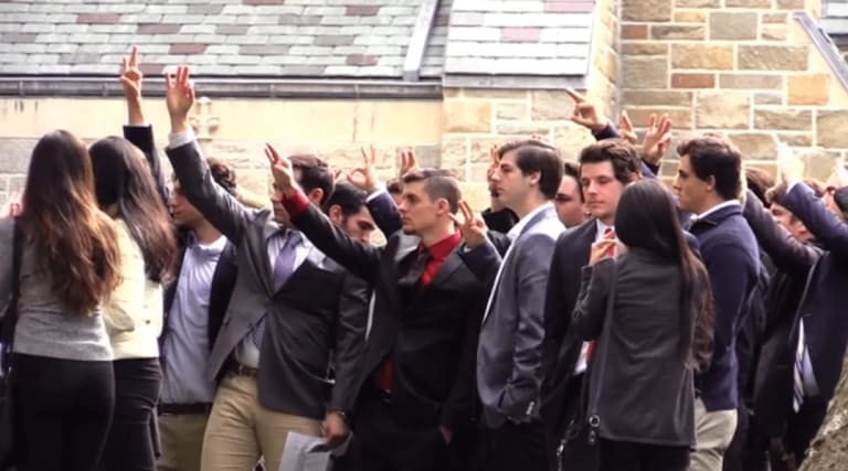 Robby's teammates raising threes outside the funeral