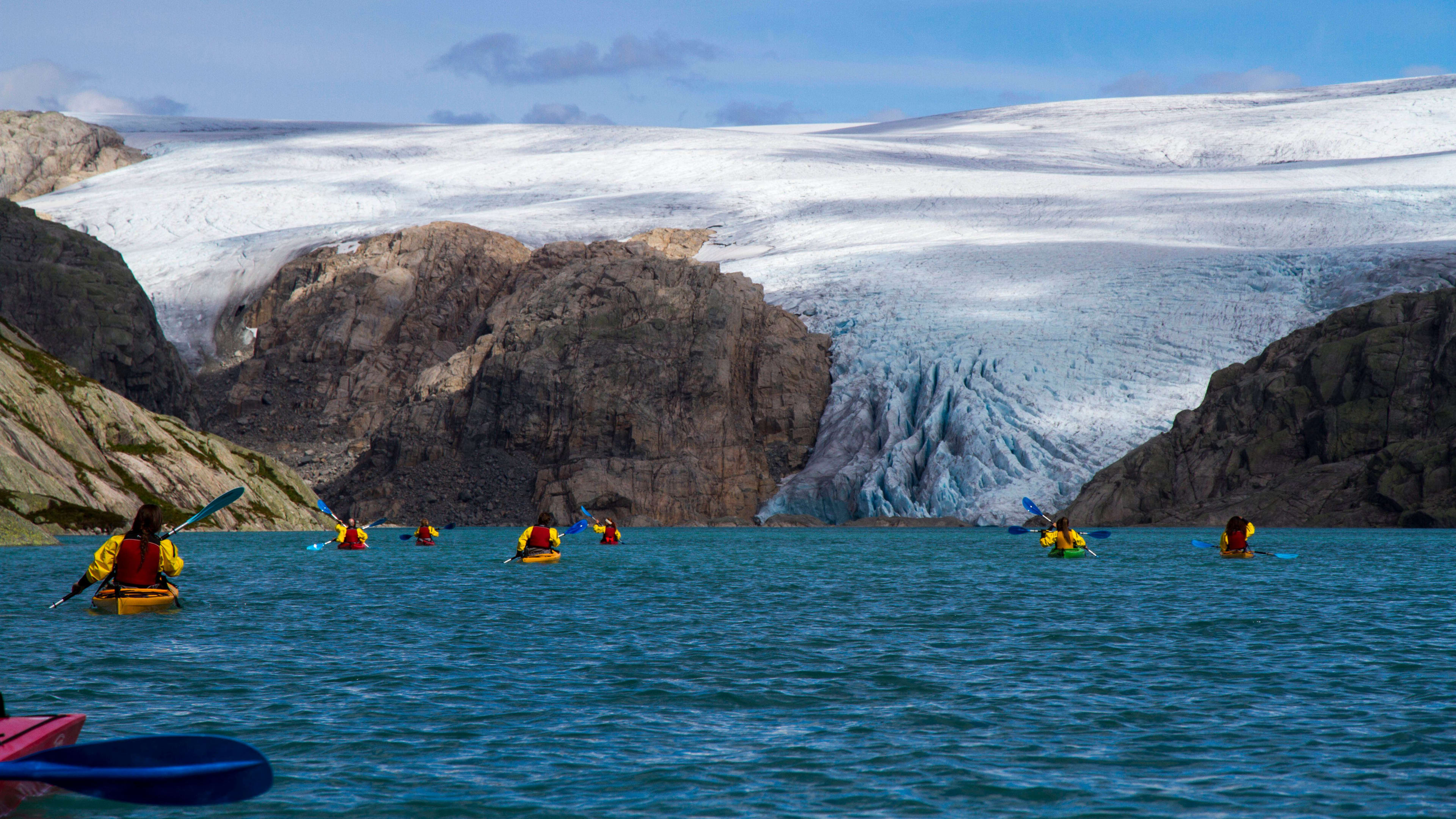 Kayaking on the water by the Folgefonna glacier is truly an adventure