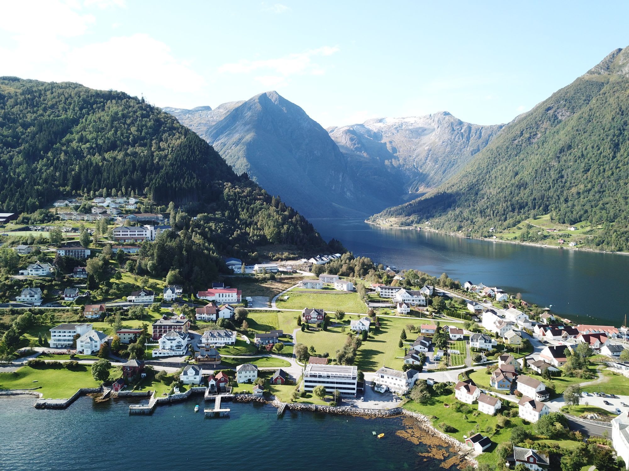 Aerial view of Balestrand village with historic Midtnes Hotel in Sognefjord - Norway's most beautiful fjord destination
