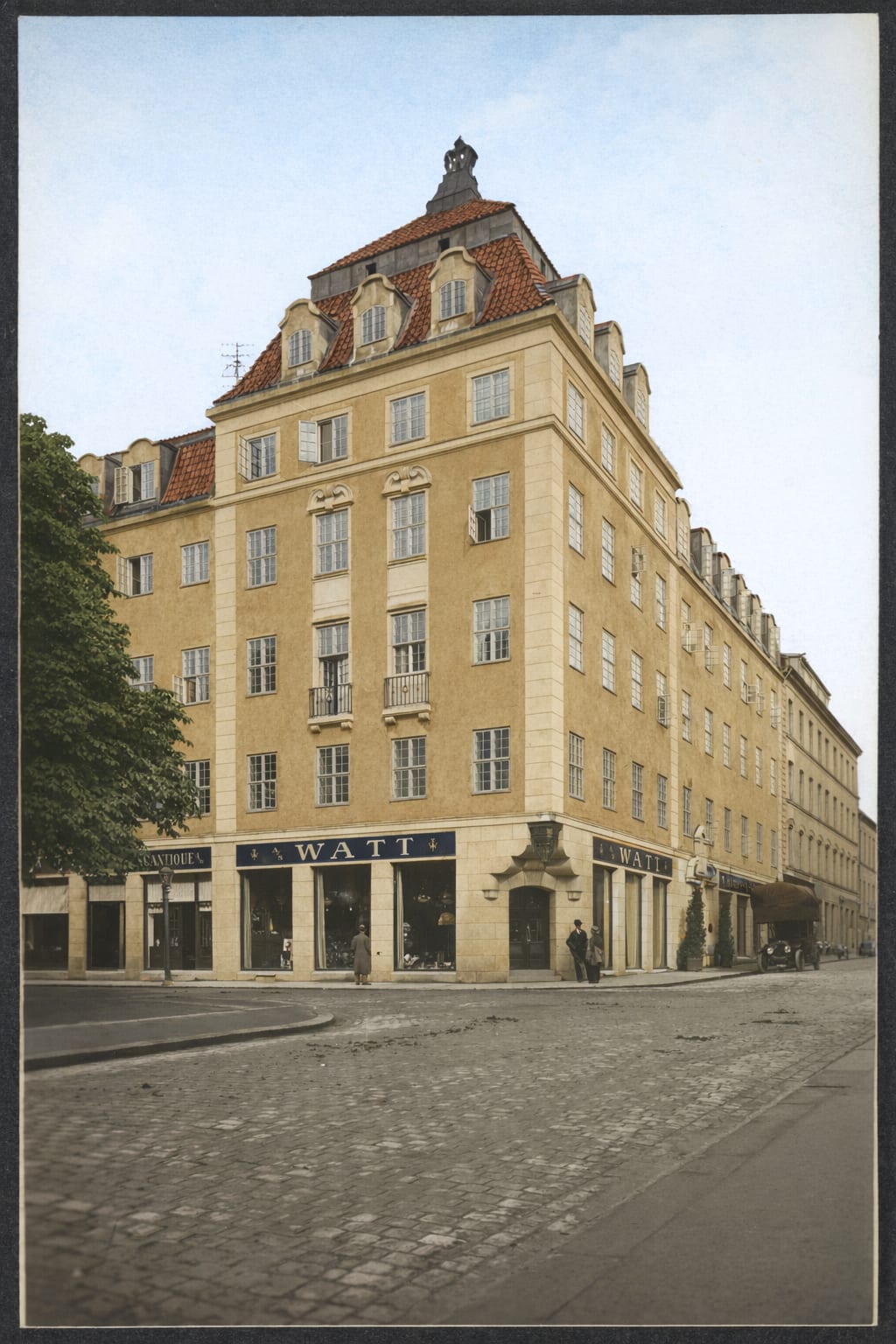 Savoy 1918 hotel facade in Oslo – beige brick building on a quiet city street.