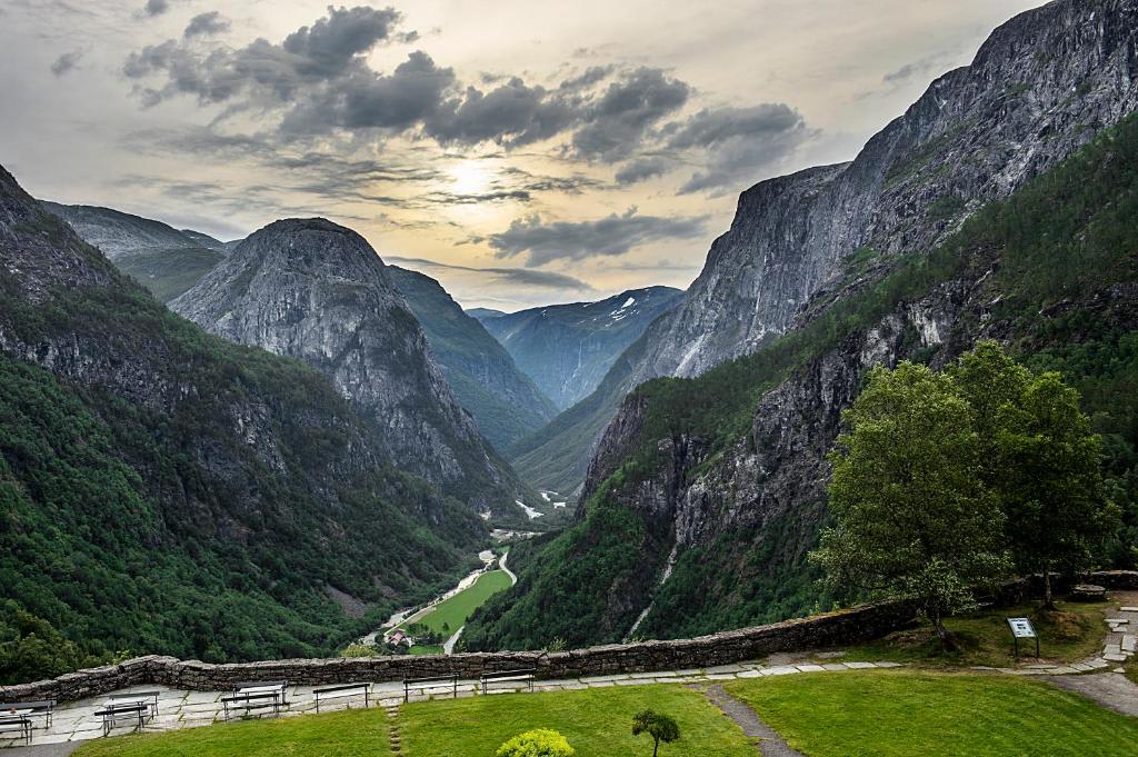 Stunning UNESCO fjord valley view from historic Stalheim Hotel in Norway featuring dramatic mountains and lush green landscape