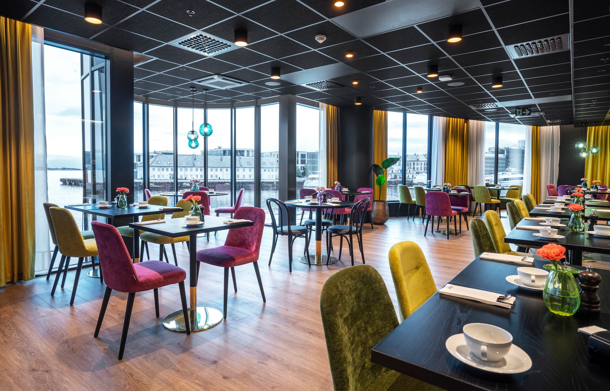 Thon Hotel Ålesund restaurant dining room featuring sea views and contemporary interior