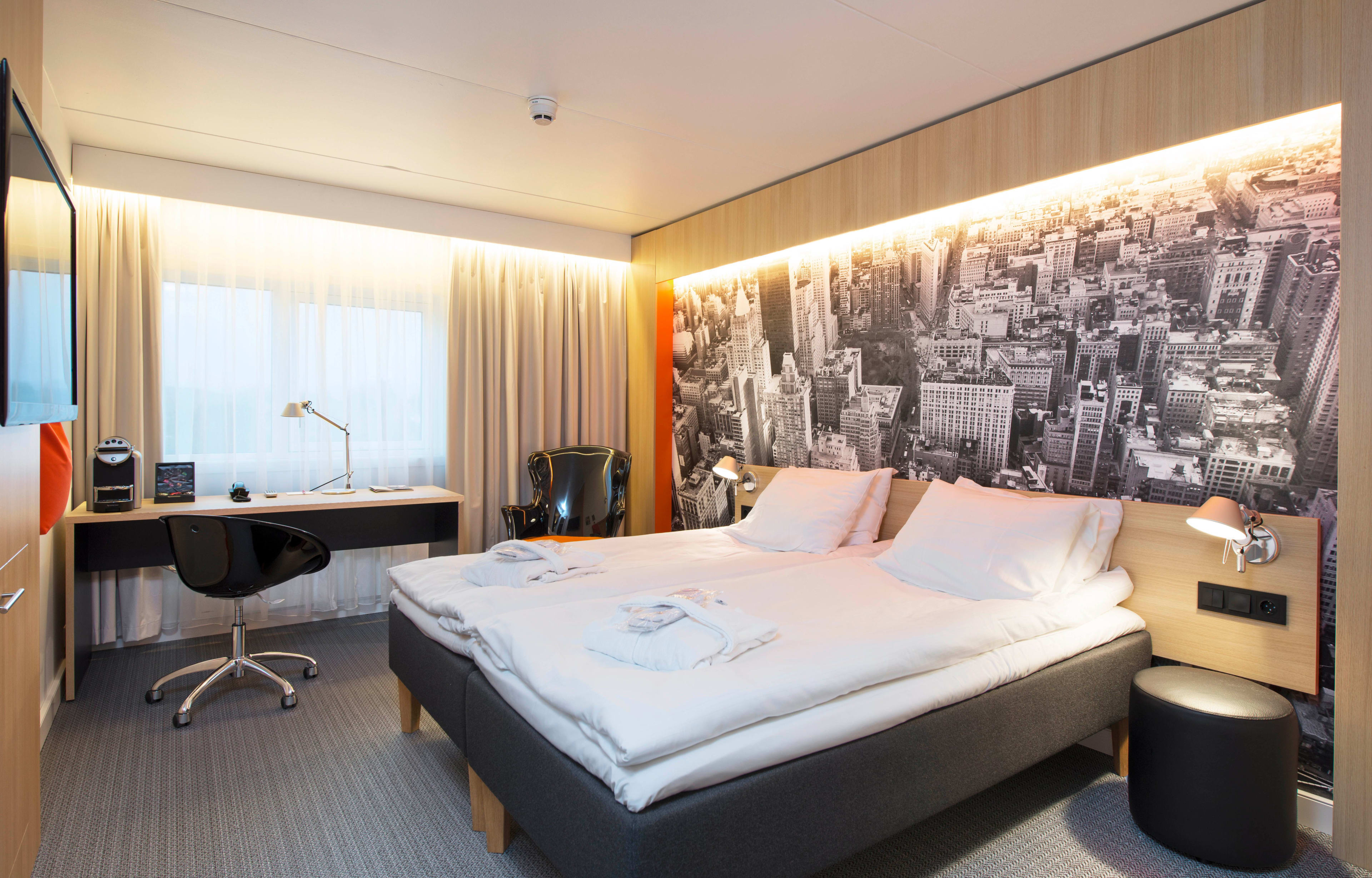 Double room at Thon Hotel Bergen Airport with queen bed and modern beige decor