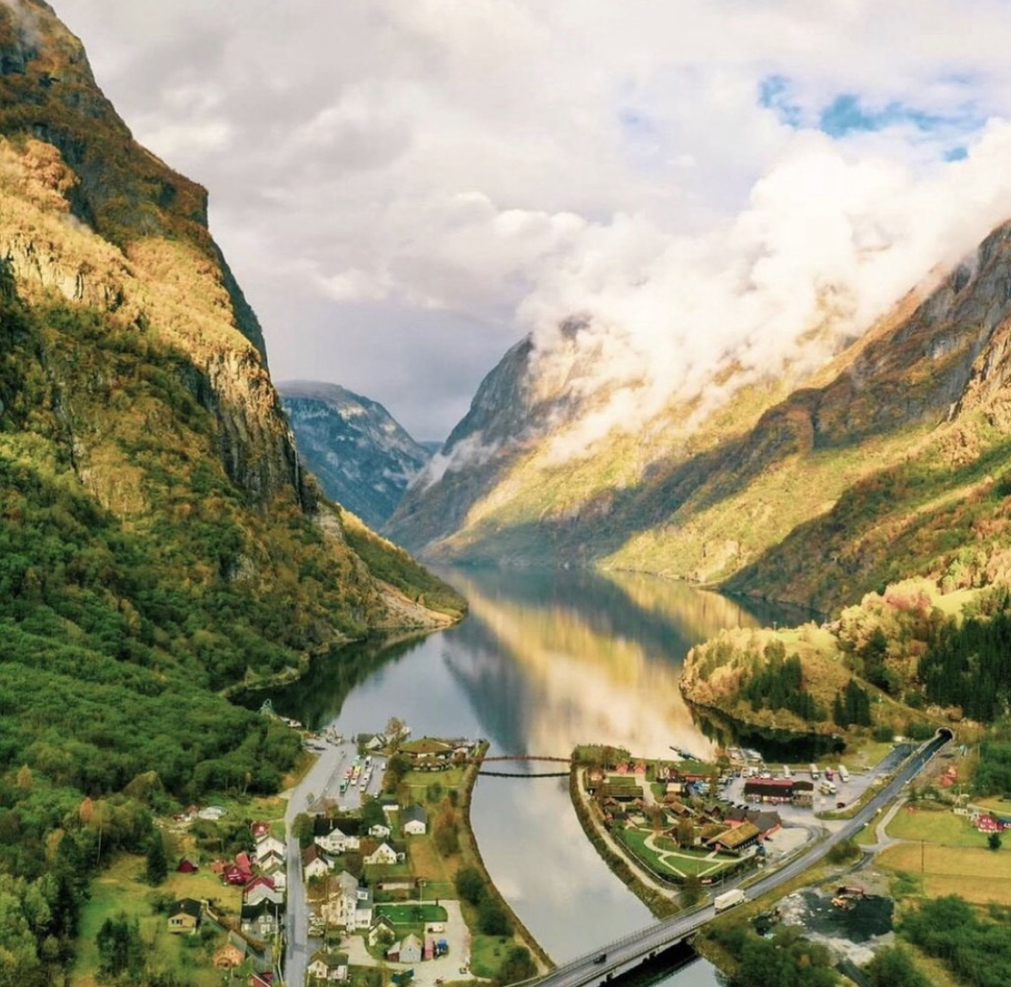 Aerial view of Gudvangen village in UNESCO Nærøyfjord with Viking Village and dramatic mountains