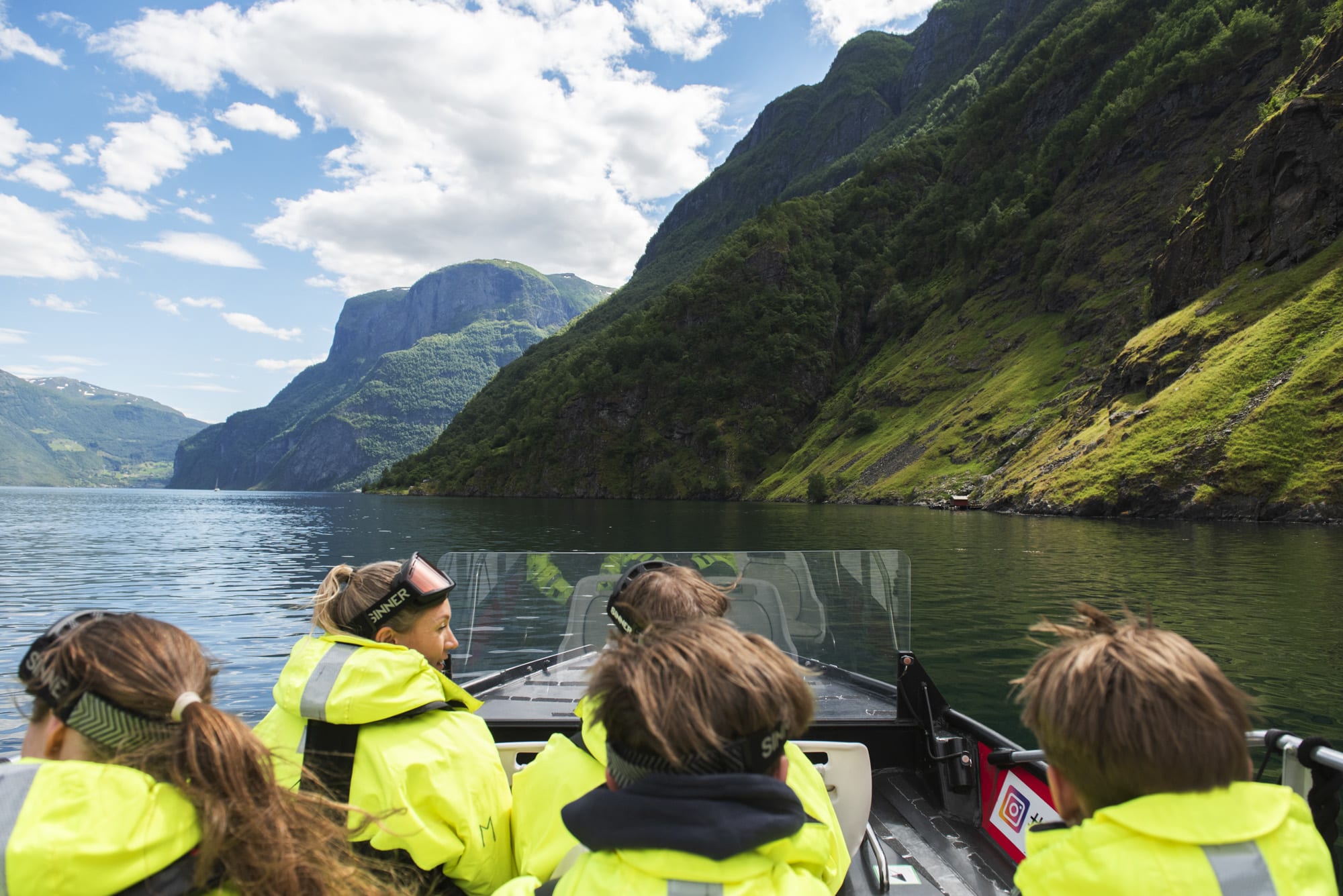 Fjord safari boat tour to Sagofossen waterfall in Flåm with UNESCO fjord landscape