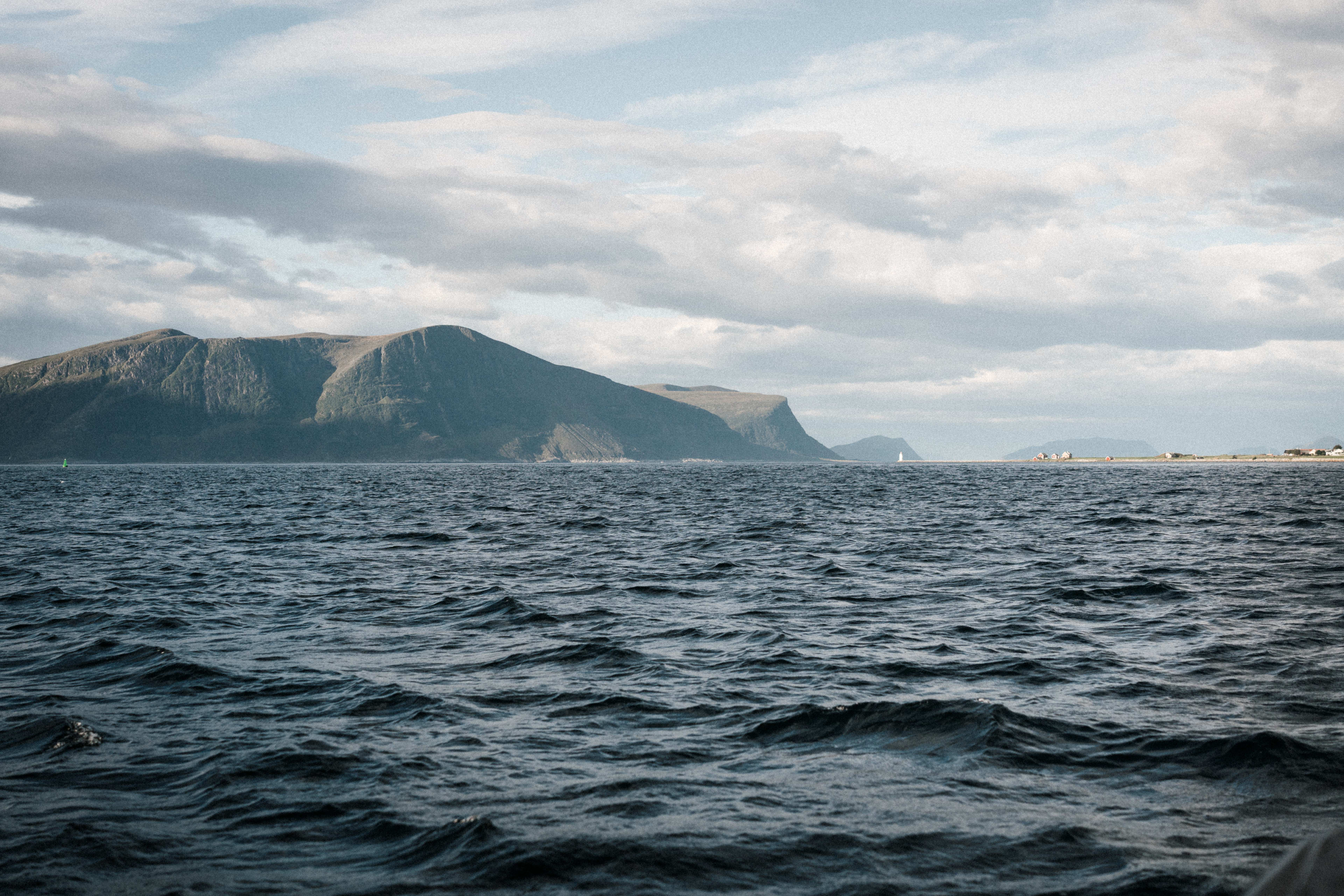 RIB boat tour from Ålesund exploring the rugged Norwegian coastline with islands and open ocean views