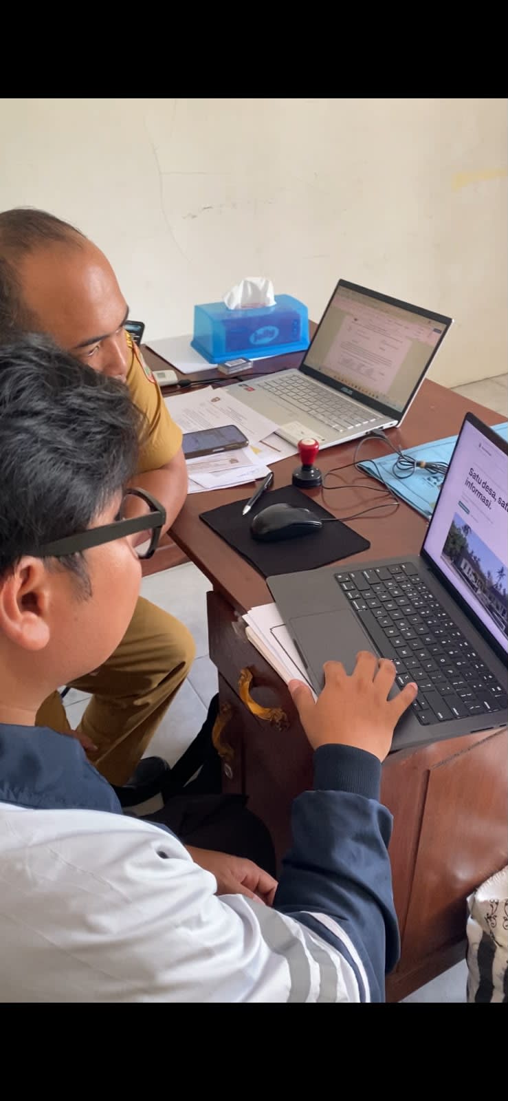 Sosialisasi website kepada perangkat Desa Garangan