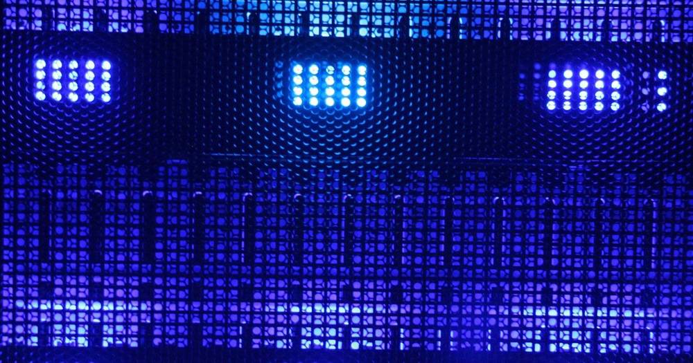 Close-up of a user clicking a 'Launch Website' button on a hosting interface