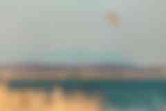 Kitesurfing with a foil board at Aliki beach, Limnos