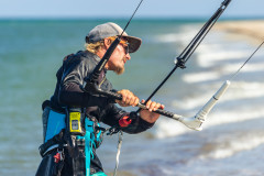 Kitesurf instructor showing kite control