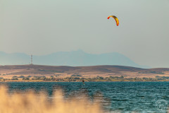 Kitesurfing with a foil board at Aliki beach, Limnos