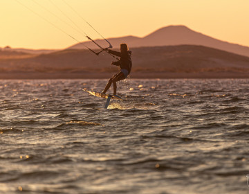 Sunset kitesurfing with a Cabrinha Double Agent foil board at Aliki beach, Limnos