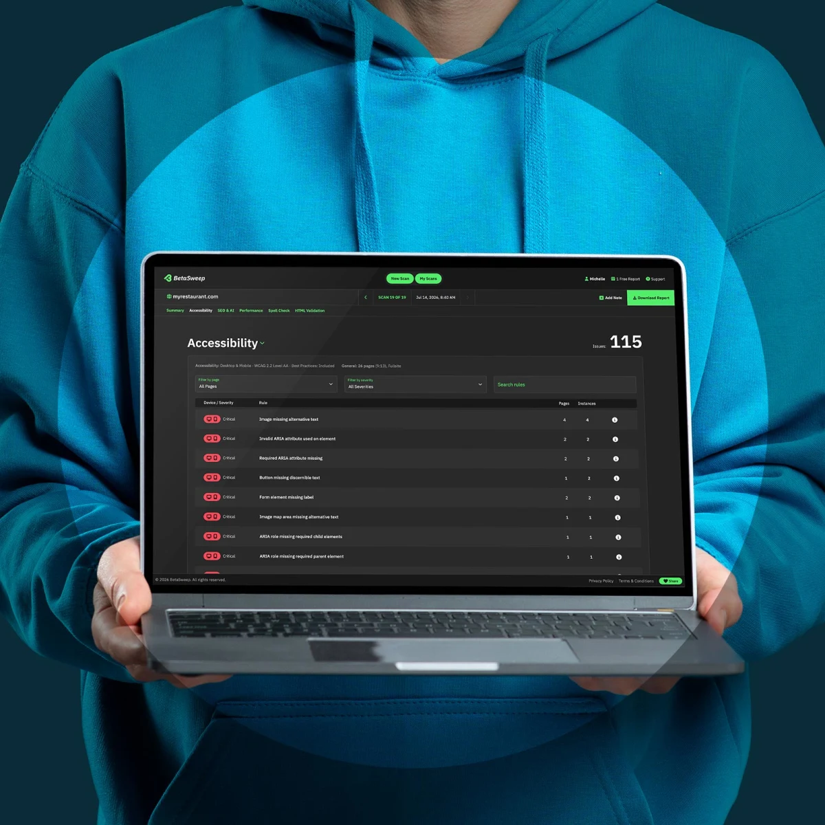 person holding a laptop that's showing BetaSweep's summary of a fullsite scan