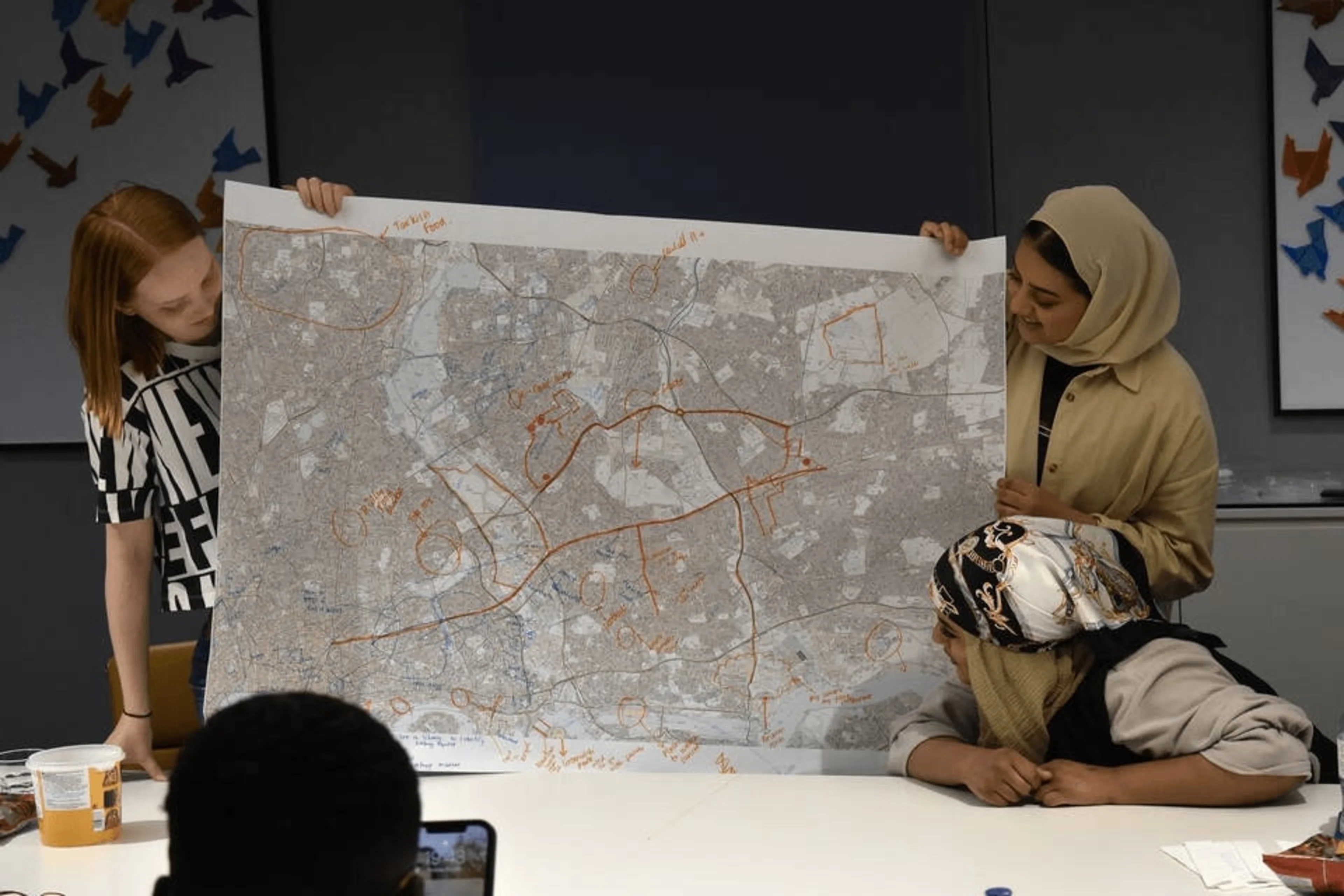 V&A East Youth Collective members, Kate, Nabiha and Faizah presenting their personalised map of east London as part of Resolve Collective’s 'Starting From the Ends’ workshop