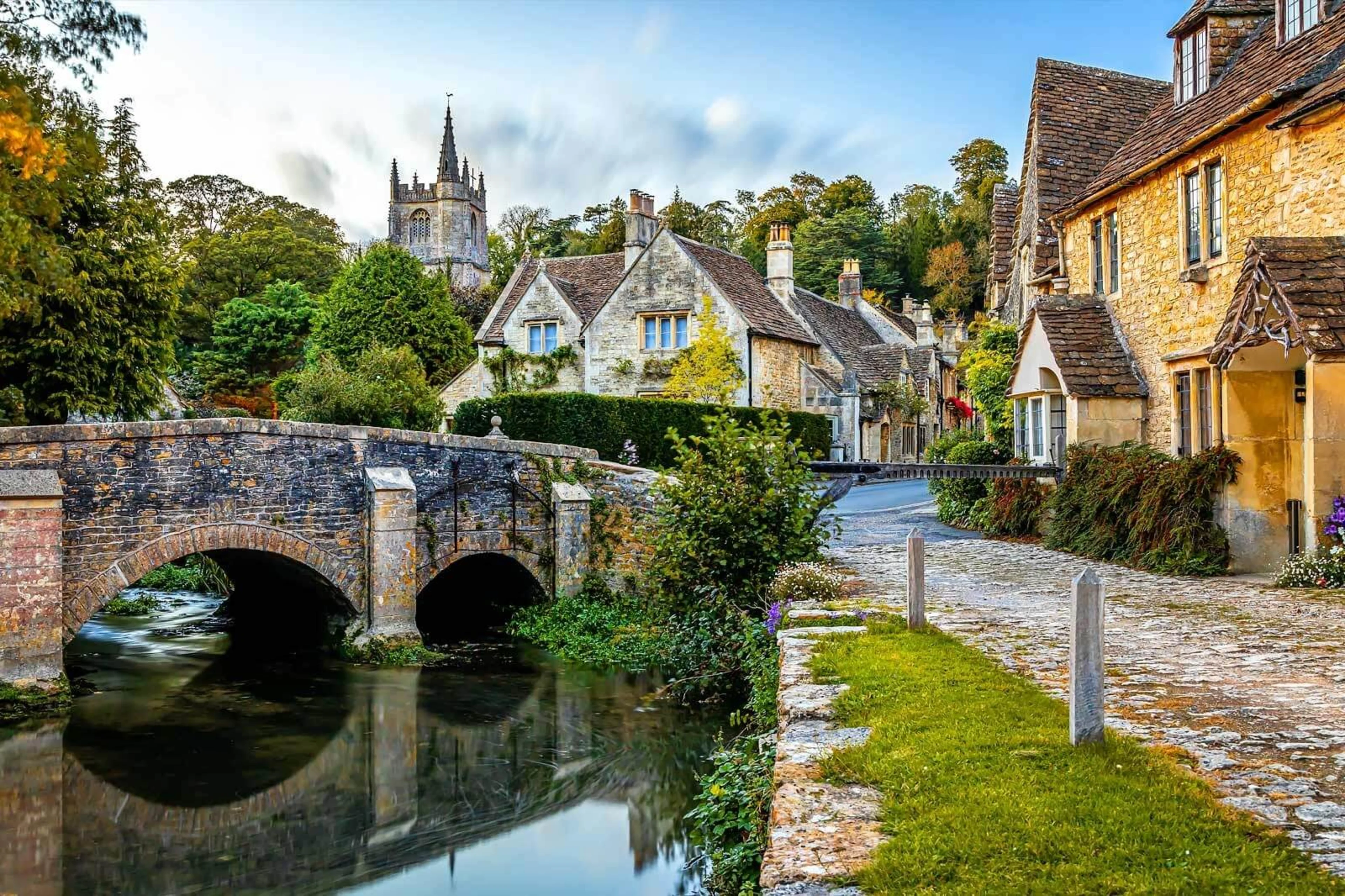 The vibrant English countryside with glorious sunshine and lush greenery.