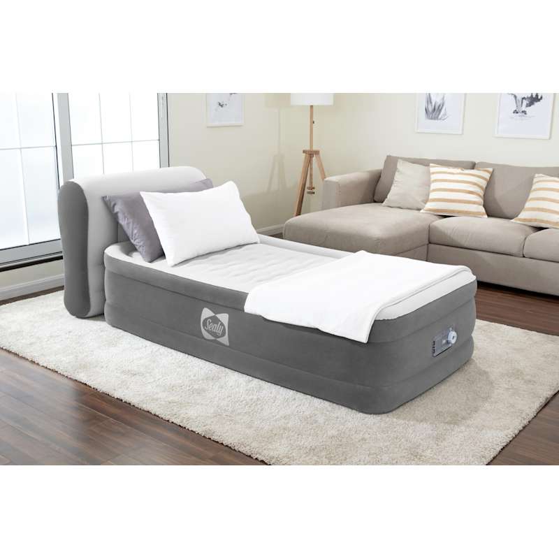 Air bed top with headboard