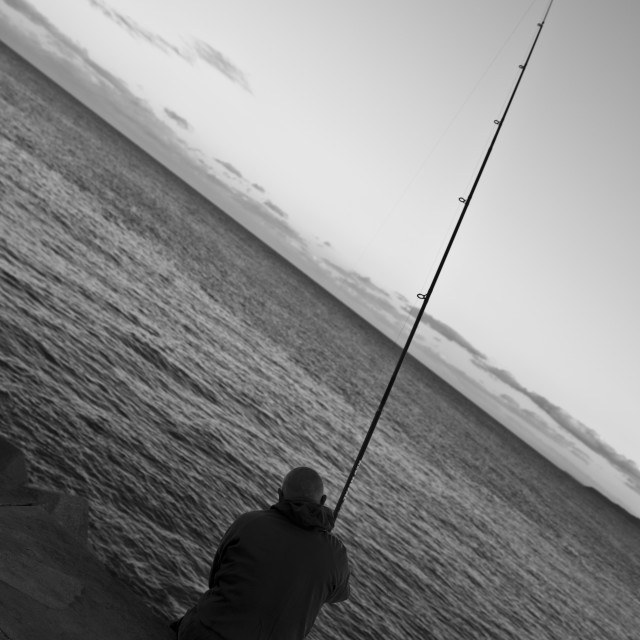 "The Twilight Fisherman" stock image