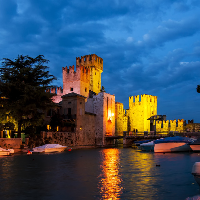 "Sirmione Castle, evening floodlights" stock image