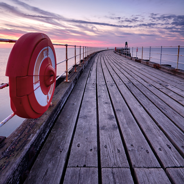 "Whitby Pier at Sunset" stock image