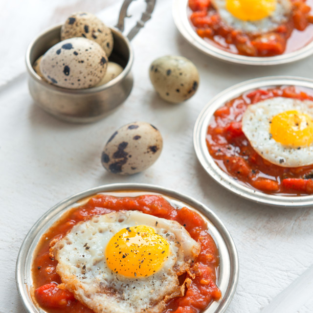 "Omelette of quail eggs with tomato sauce" stock image