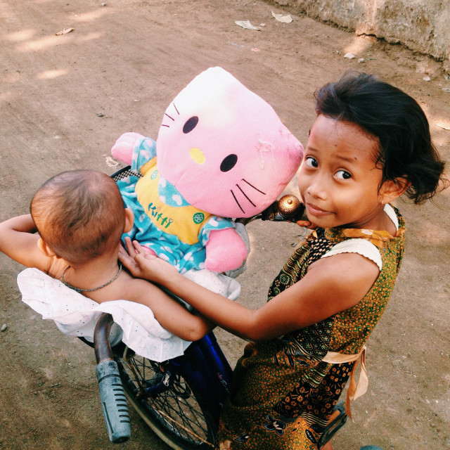 "Indonesian Children on Bike" stock image