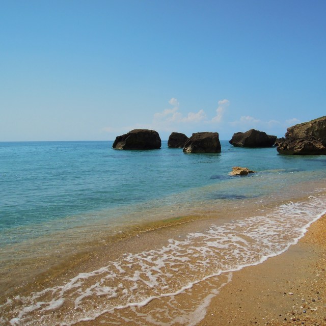 "A peaceful Greek beach" stock image