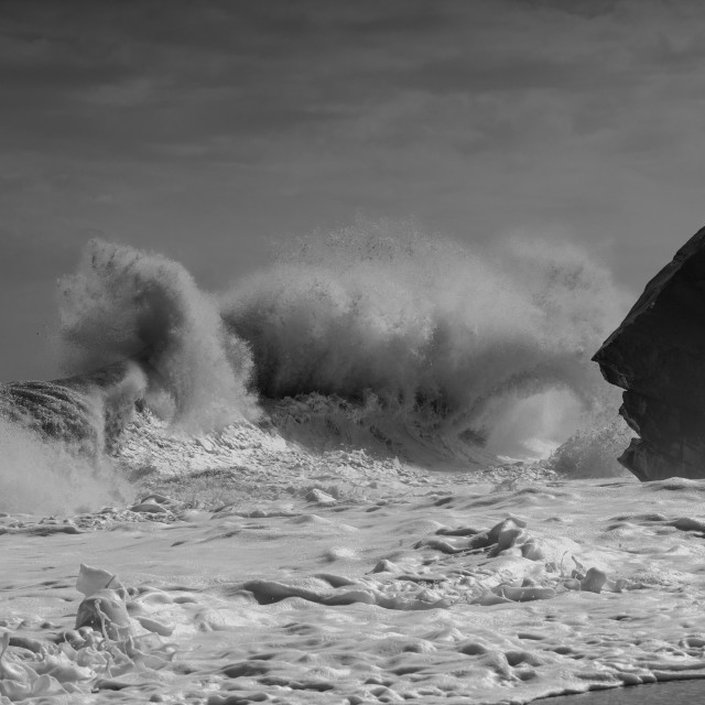 "Waves in front of a lion face" stock image