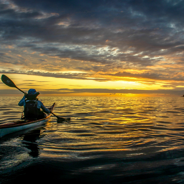 "Sea kayak sunset" stock image