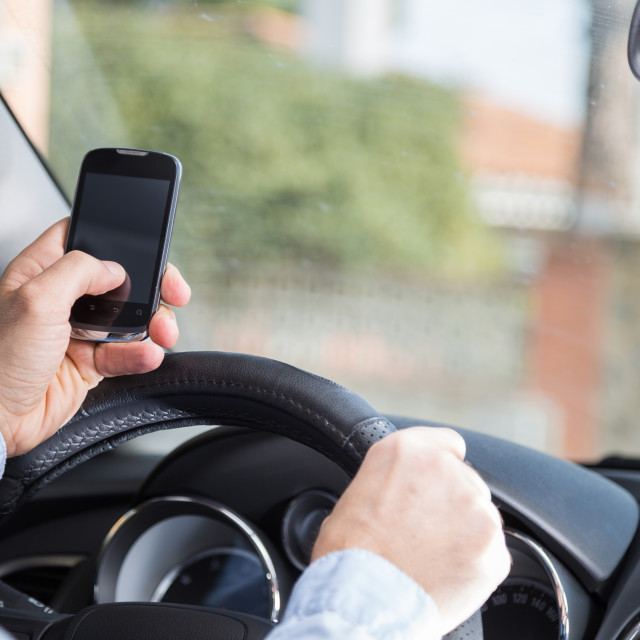 "Man with mobile and driving" stock image