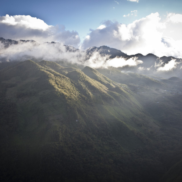 "Storm clearing over a valley in Guatemala" stock image