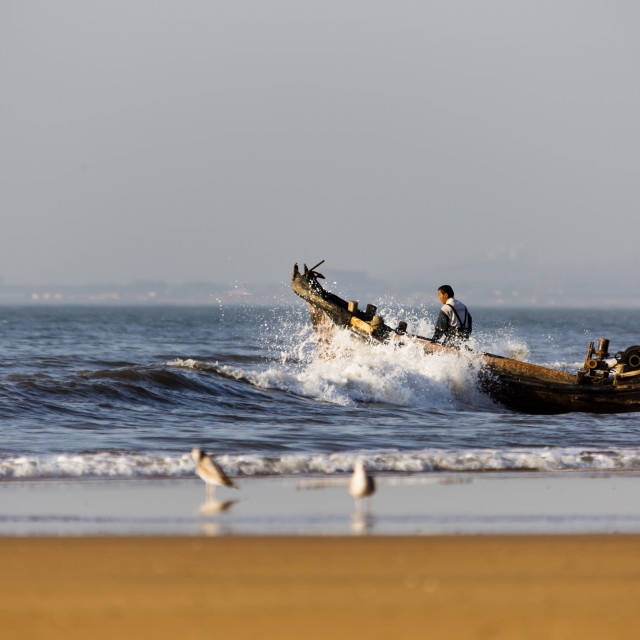 "Setting off back out to sea" stock image