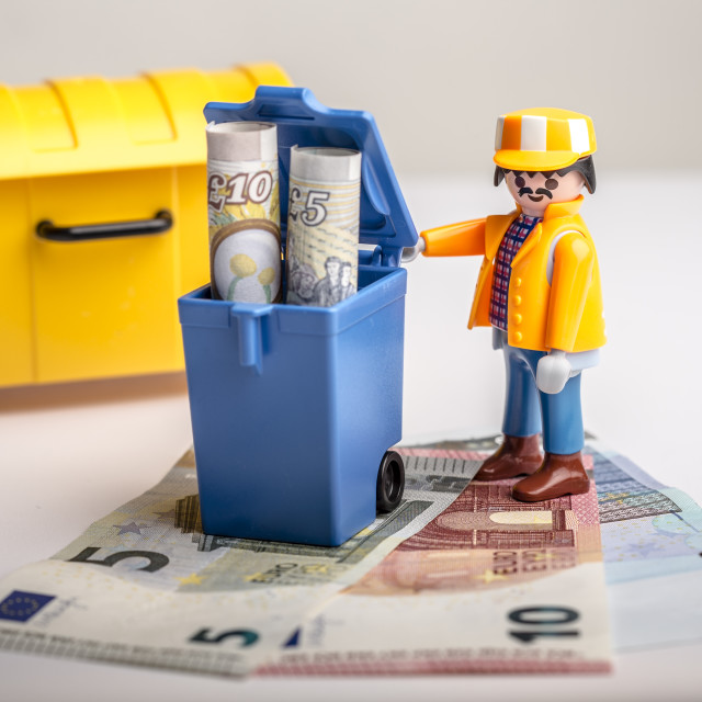 "Throwing away pounds" stock image