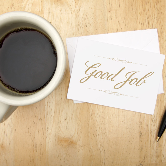 "Good Job Note Card, Pen and Coffee Cup on Wood Background." stock image