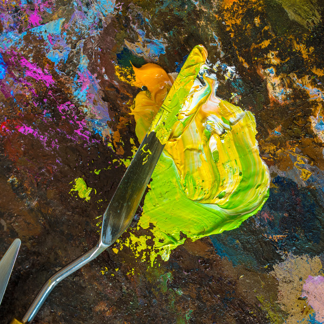 "Palette knife on a palette for mixing oil paints" stock image