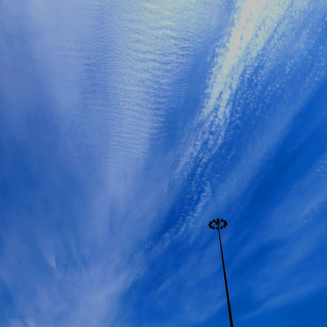 "Light Standard Against Clouds" stock image