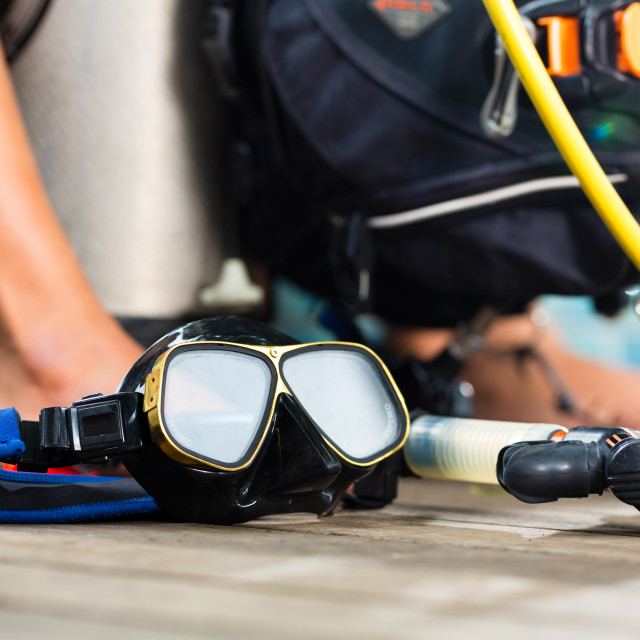 "divemaster and students at the diver Course on holiday wearing a wetsuit or..." stock image