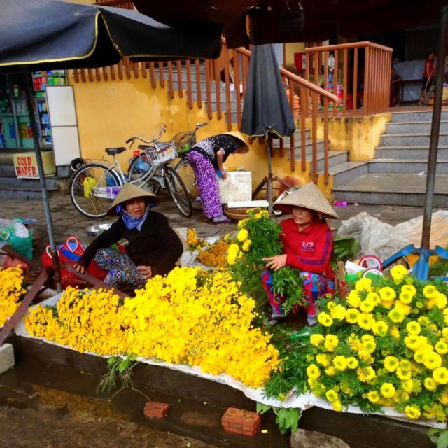 "Flowers for sale at Hoi An local market" stock image