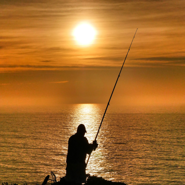 "sunset fishing" stock image