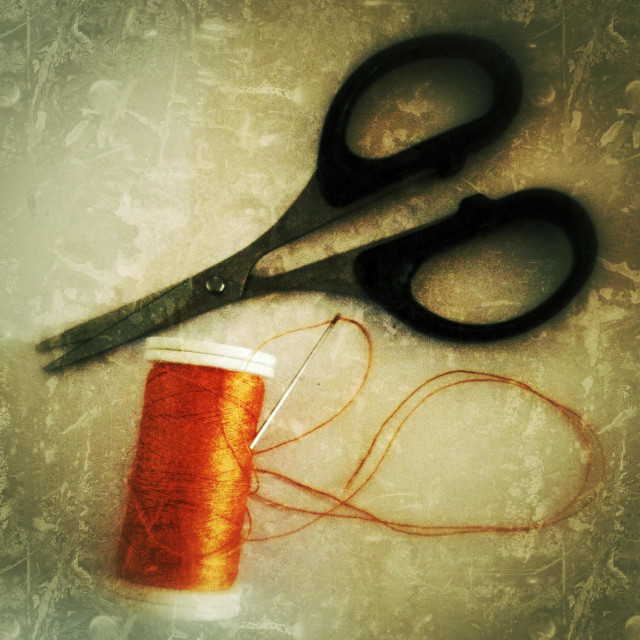 "Scissors and sewing tread" stock image