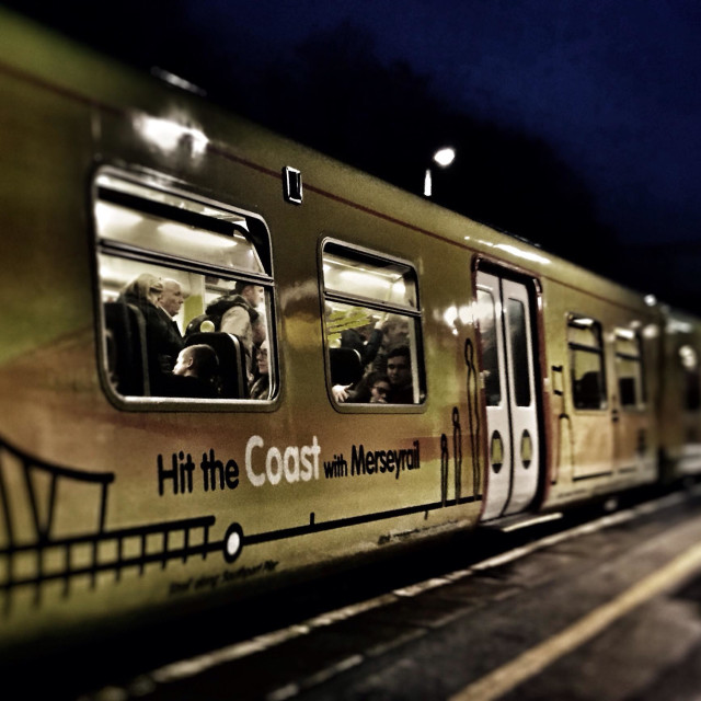 "Mereyrail train arriving at Maghull Station" stock image