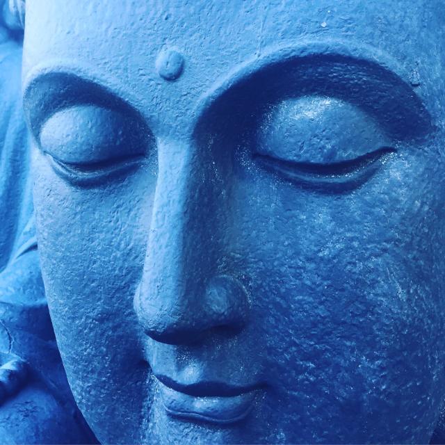 "Buddha face stone statue" stock image