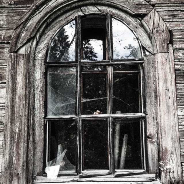 "The old window with broken glass and wooden frame" stock image