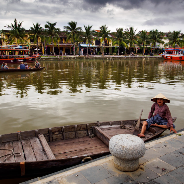 "Woman waiting in a boat" stock image