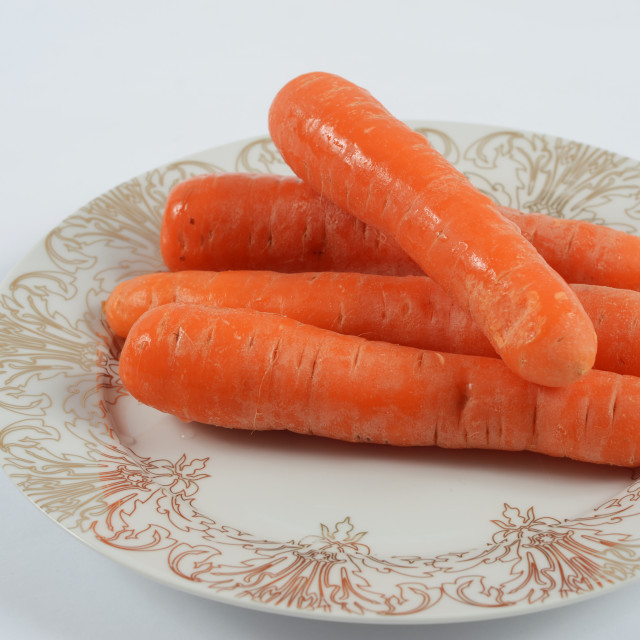 "Carrots on a plate" stock image