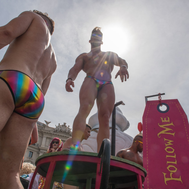 "Gay pride day in Rome. People dancing on a float during parade" stock image