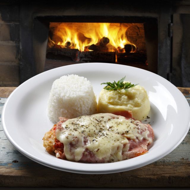 "The steak parmigiana with potato and rice" stock image
