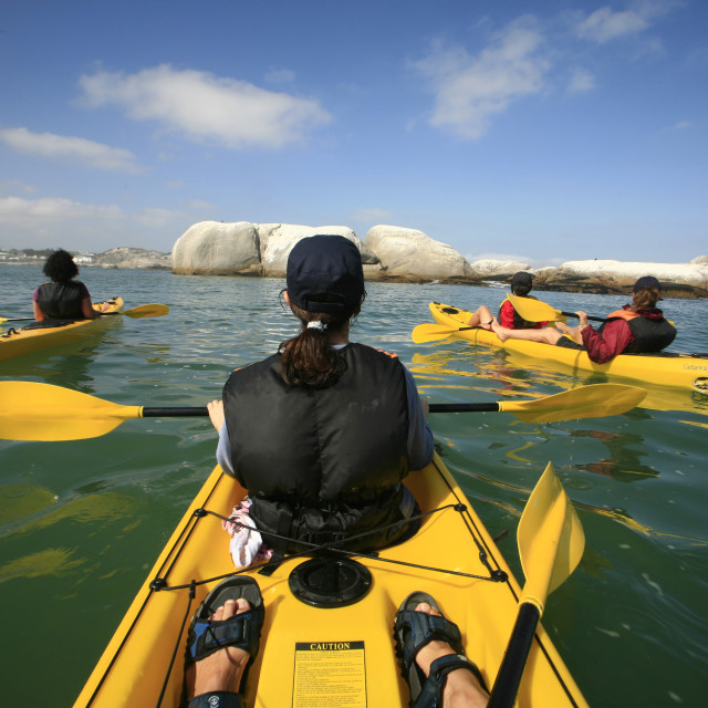 sea kayaking near boulders at Paternoster, West Coast, Western Cape
