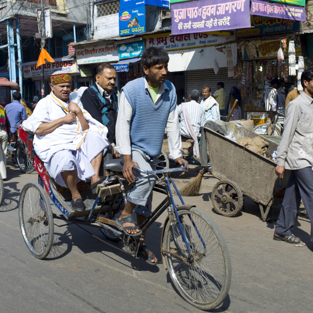 "Rickshaw with passengers at Khari Baoli in Old Delhi, India" stock image